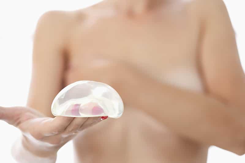 Although generally considered safe, there are risks associated with silicone implants, including rupture and capsular contracture. Ruptured silicone implants occur when the cohesive gel inside breaks down and slowly leaks out into the body or breast area, causing pain, inflammation, and other symptoms. In cases such as this, surgical removal of the implant may be necessary to alleviate symptoms and prevent further damage to surrounding tissue and organs. Additionally, women with breast implants may also experience capsular contracture, which occurs when excessive scar tissue builds up around an implant resulting in hardening or distortion of natural breasts.